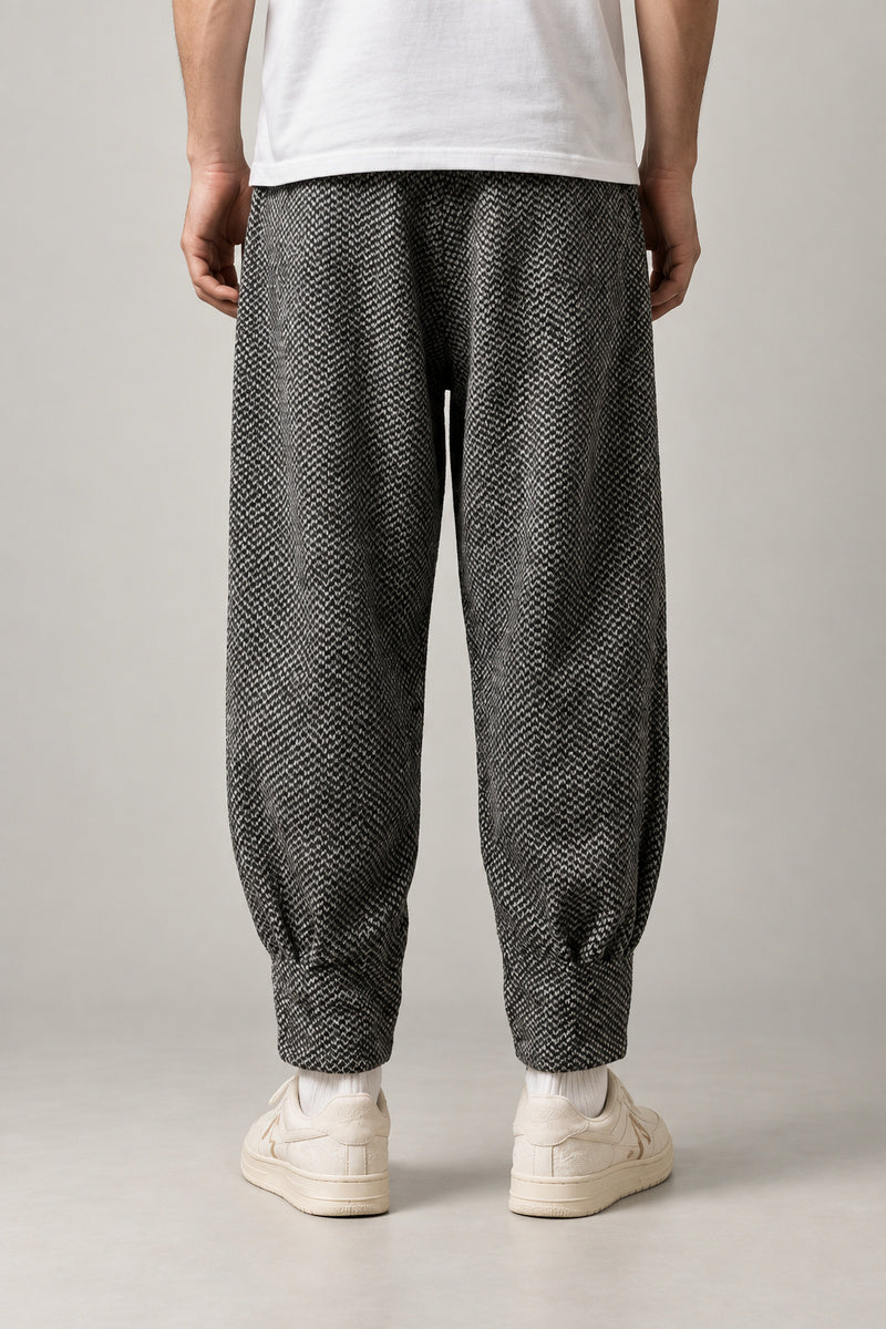 Flecked Grey Tapered Pants 'Sunago' – back view of the flecked grey tapered trousers
