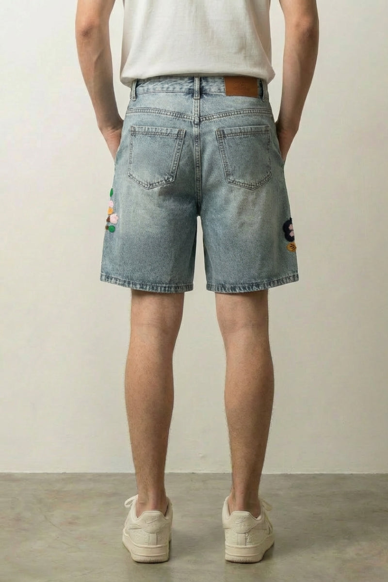 Flower Embroidered Denim Shorts 'Nohana' – back view on model, studio