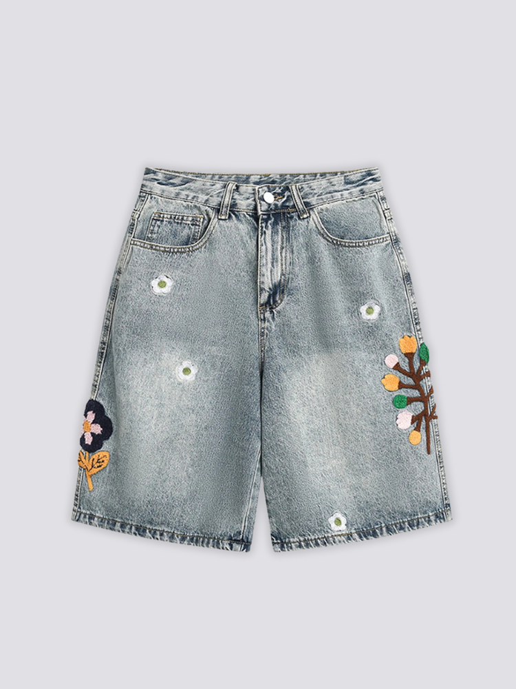 Flower Embroidered Denim Shorts 'Nohana' – flat lay front view of the light blue denim shorts