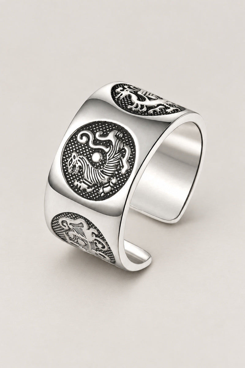 Four Guardians Ring 'Shijin' – wide open sterling silver band ring with the four guardian beasts in round medallions, Japanese shijin ring, studio view