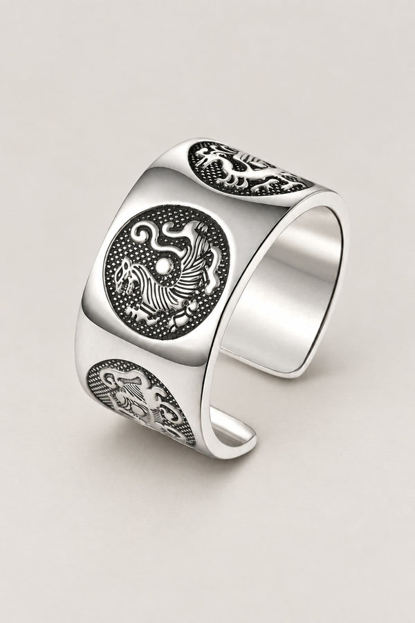 Four Guardians Ring 'Shijin' – wide open sterling silver band ring with the four guardian beasts in round medallions, Japanese shijin ring, studio view