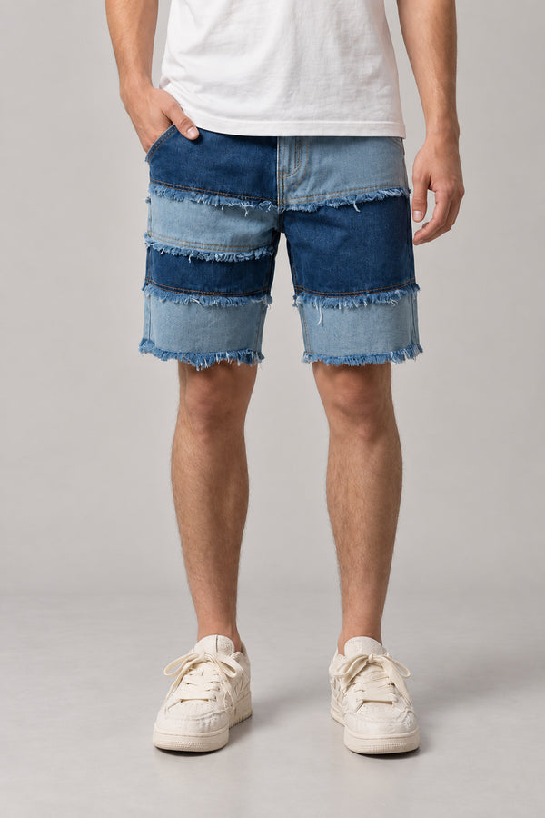 Frayed Seam Patchwork Shorts 'Hotsure' – blue patchwork denim shorts with frayed seams in three washes, Japanese streetwear shorts, front view on model