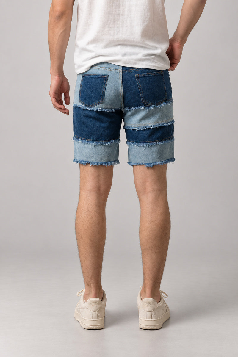 Frayed Seam Patchwork Shorts 'Hotsure' – back view of the blue patchwork denim shorts, on model