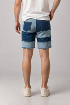 Frayed Seam Patchwork Shorts 'Hotsure' – back view of the blue patchwork denim shorts, on model