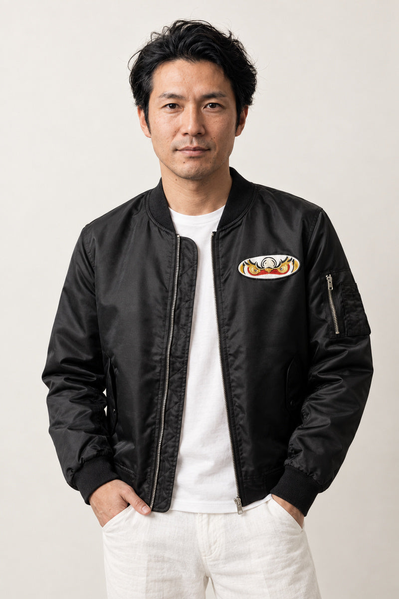 Fujin Wind God Bomber Jacket 'Kazabukuro' – black MA-1 style bomber jacket with embroidered Fujin patch, Japanese streetwear, front view on model