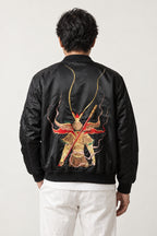 Fujin Wind God Bomber Jacket 'Kazabukuro' – back view of black bomber jacket showing the embroidered Fujin wind god with his wind bag