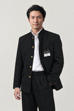 Gakuran 'Tsumeeri' – black gakuran jacket worn open with matching trousers, Japanese male school uniform, three-quarter view on model