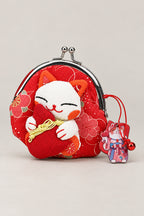 Gamagucci – red gamaguchi clasp purse with plush lucky cat holding a mallet, Japanese coin purse, studio view