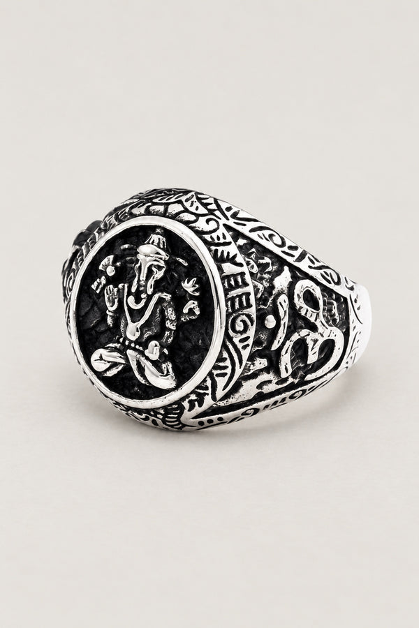 Ganesha Signet Ring 'Shoten' – stainless steel signet ring with seated elephant-headed Ganesha on oval face and Sanskrit shoulders, studio view