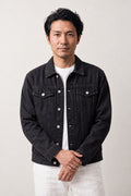 Glow Koi Embroidered Denim Jacket 'Hotaru' – black denim jacket with embroidered koi carp, Japanese streetwear denim jacket, front view on model