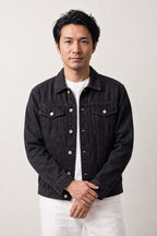 Glow Koi Embroidered Denim Jacket 'Hotaru' – black denim jacket with embroidered koi carp, Japanese streetwear denim jacket, front view on model