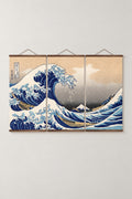 Great Wave Triptych Canvas 'Sanrenfuku' – The Great Wave off Kanagawa from Hokusai's Thirty-six Views of Mount Fuji, three-panel triptych on wooden hanging rails, Japanese wall art, studio view