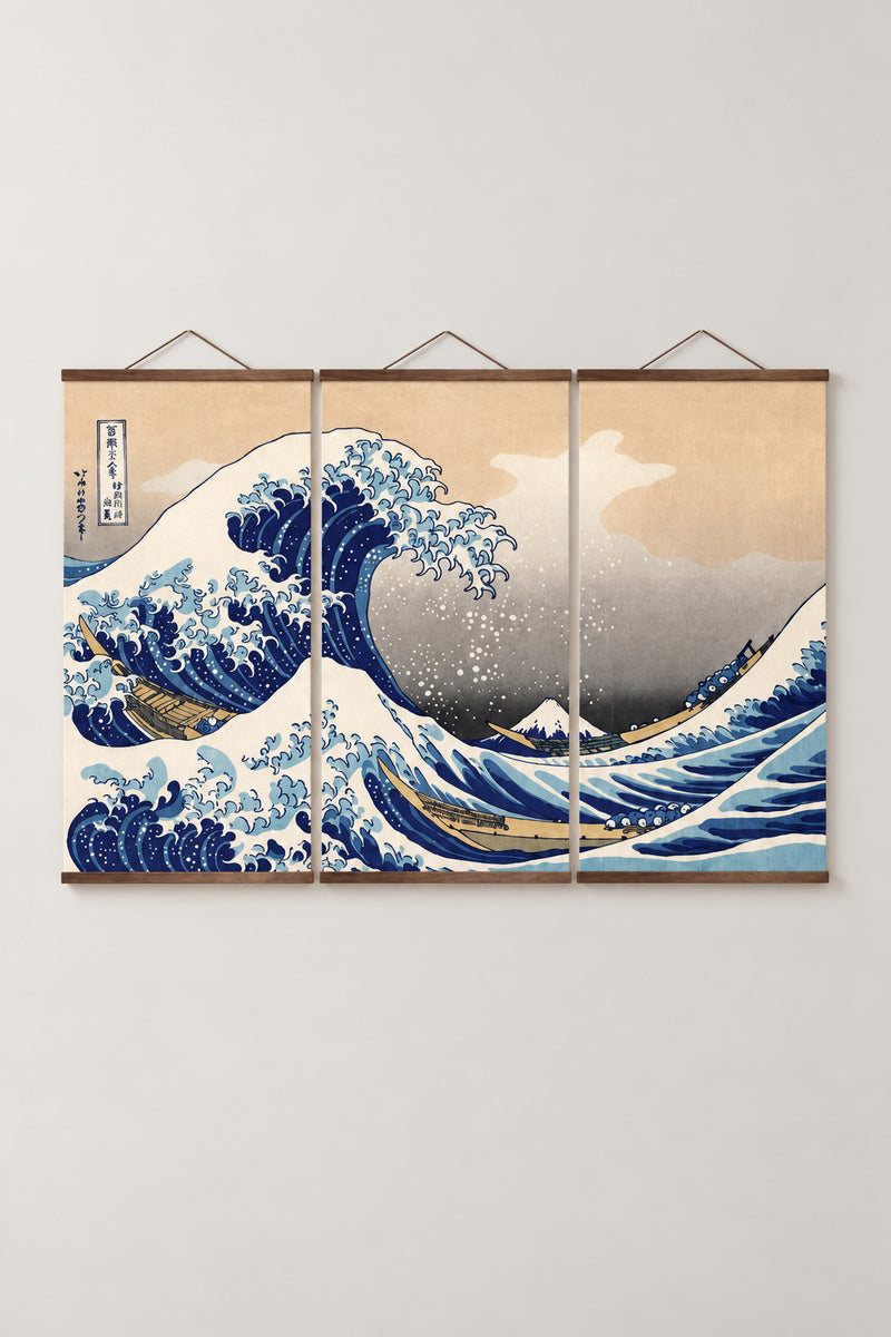 Great Wave Triptych Canvas 'Sanrenfuku' – The Great Wave off Kanagawa from Hokusai's Thirty-six Views of Mount Fuji, three-panel triptych on wooden hanging rails, Japanese wall art, studio view