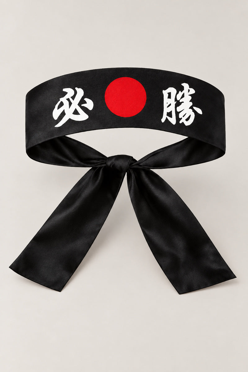 Hachimaki – black Japanese hachimaki headband with red sun and the kanji for certain victory, studio view