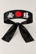 Hachimaki – black Japanese hachimaki headband with red sun and the kanji for certain victory, studio view