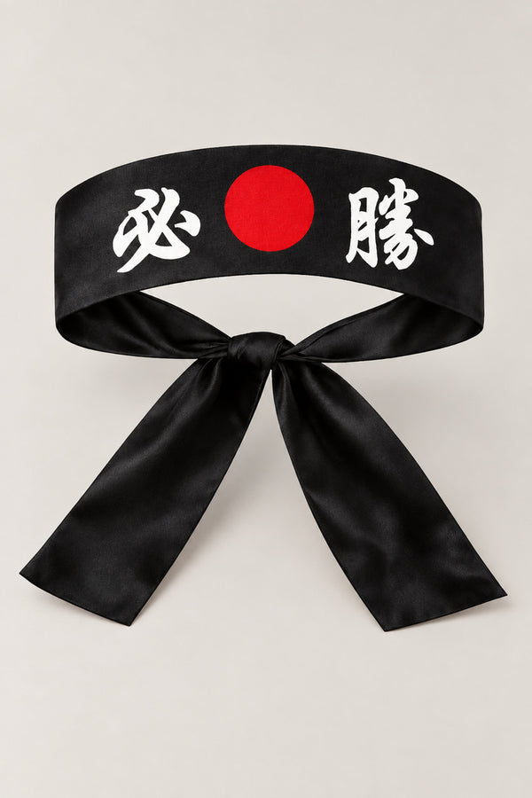 Hachimaki – black Japanese hachimaki headband with red sun and the kanji for certain victory, studio view