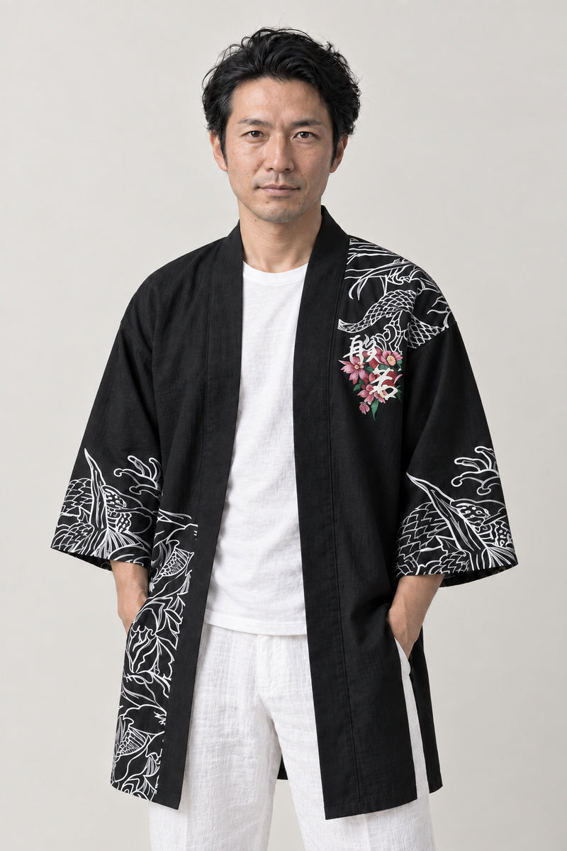 Hannya Mask Happi Coat 'Onryo' – black happi coat with hannya mask, dragon and wave print, Japanese happi coat, unisex festival jacket, front view on model