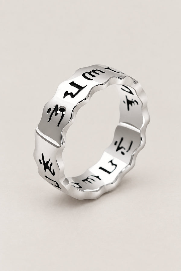 Hiragana Ring 'Kanamoji' – wavy-edged sterling silver band ring engraved with hiragana in black script, Japanese kana ring, studio view