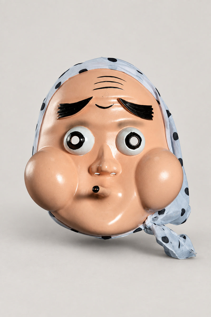 Hyottoko Mask 'Hifuki' – glossy hyottoko clown mask with puckered mouth, squinting eye and blue spotted scarf, Japanese festival mask, studio view