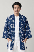 Indigo Dragon Pattern Happi 'Koryu' – indigo blue happi coat with white all-over dragon pattern print, Japanese happi coat, unisex festival jacket, front view on model
