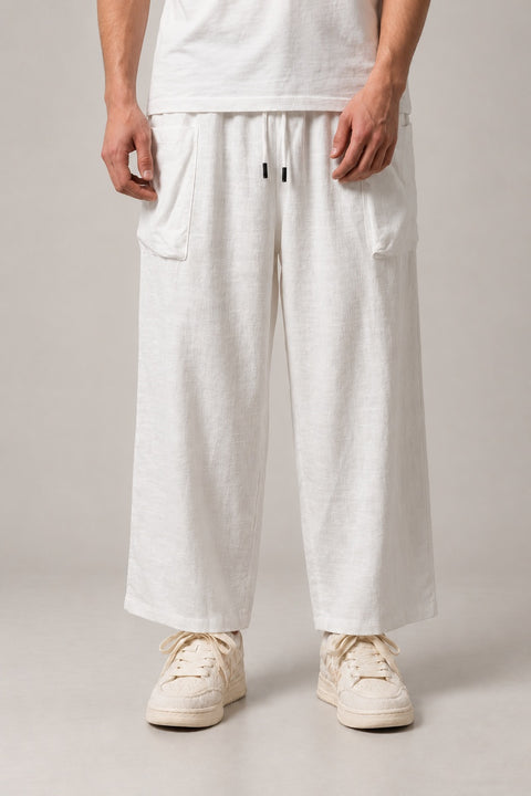 Ivory Wide Leg Hakama Trousers 'Hakuun' – ivory white wide leg hakama trousers with drawstring waist, Japanese linen-look palazzo pants, front view on model
