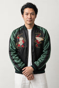 Japan Lantern Souvenir Jacket 'Chochin' – black and green sukajan with embroidered lucky cat, fan and lantern, Japanese sukajan souvenir bomber jacket, front view on model