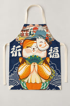 Japanese Apron – navy bib apron printed with a praying lucky cat over waves, Japanese maneki neko kitchen apron with neck loop and waist ties, studio view