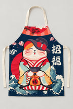 Japanese Apron – cream bib apron printed with a lucky cat in a kimono and cherry blossom, Japanese maneki neko kitchen apron with neck loop and waist ties, studio view