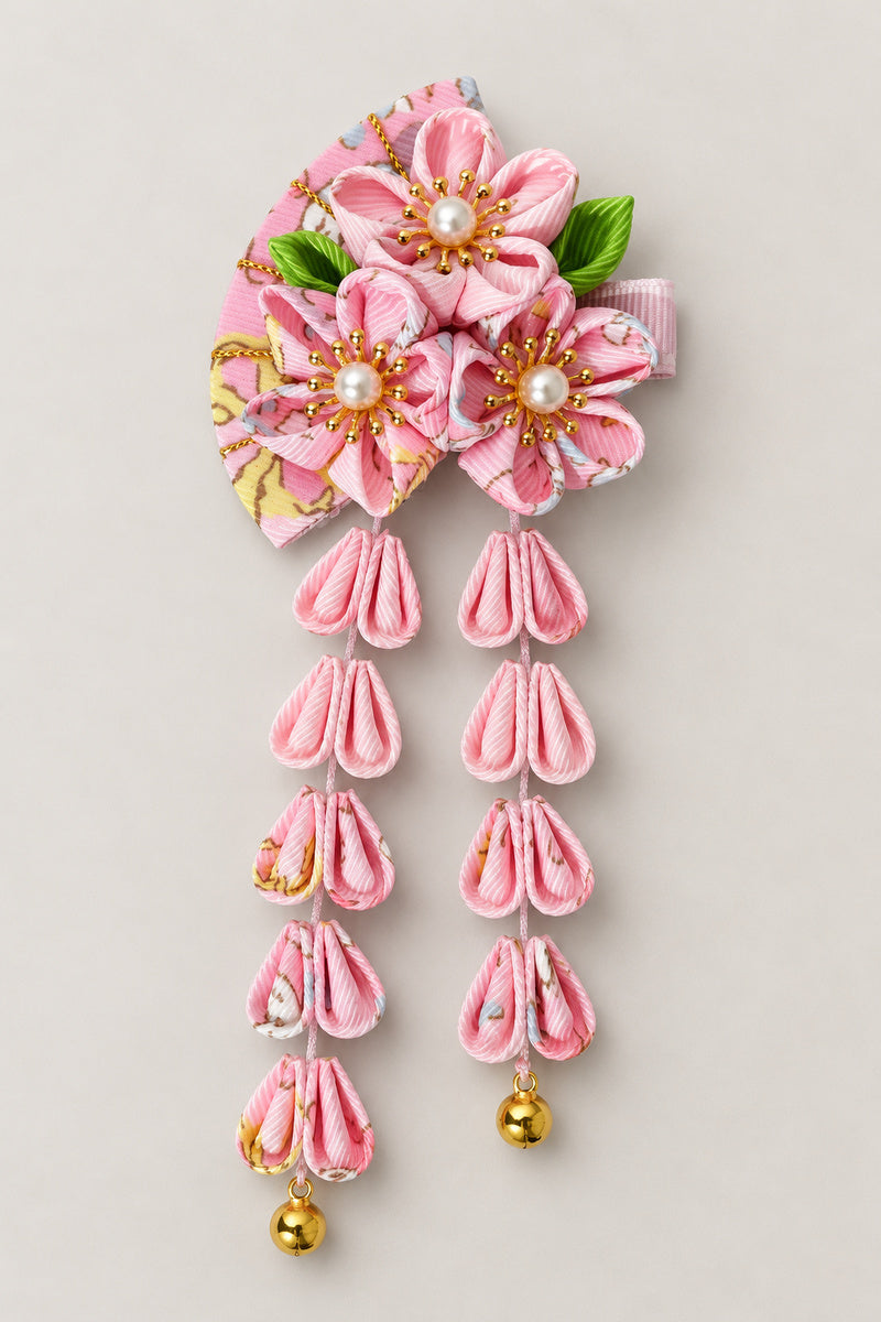 Japanese Hair Pin – pink tsumami kanzashi hair clip with cherry blossom cloth flowers and hanging strands, studio view