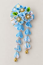 Japanese Hair Pin – blue tsumami kanzashi hair clip with folded cloth flowers and hanging strands, studio view
