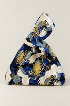 Japanese Knot Bag – navy Japanese knot bag with cranes and gold chrysanthemum print, kimono cloth handbag, studio view