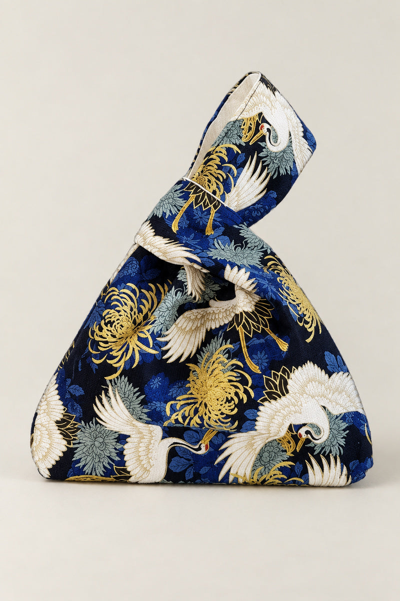 Japanese Knot Bag – navy Japanese knot bag with cranes and gold chrysanthemum print, kimono cloth handbag, studio view