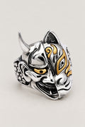 Japanese Mask Ring 'Nimen' – stainless steel two-faced mask ring with horned oni demon on one side and gold-marked kitsune fox on the other, Japanese mask ring, studio view