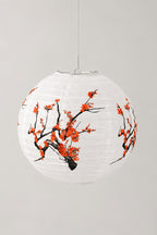 Japanese Paper Lantern 'Bonbori' – round white paper lantern printed with red plum blossom on black branches, hanging Japanese lantern shade, studio view