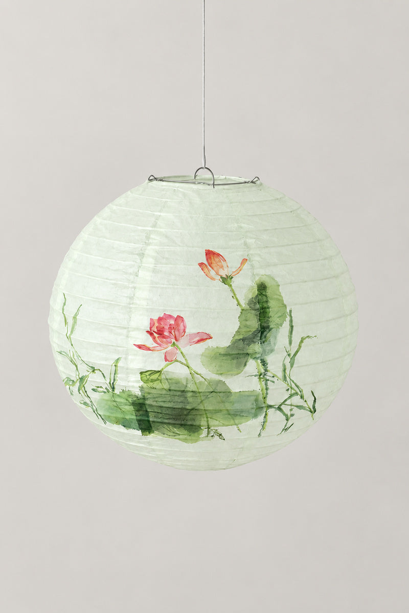 Japanese Paper Lantern 'Bonbori' – round white paper lantern printed with a pink lotus and green leaves, hanging Japanese lantern shade, studio view
