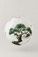 Japanese Paper Lantern 'Bonbori' – round white paper lantern printed with a pine tree in ink, hanging Japanese lantern shade, studio view