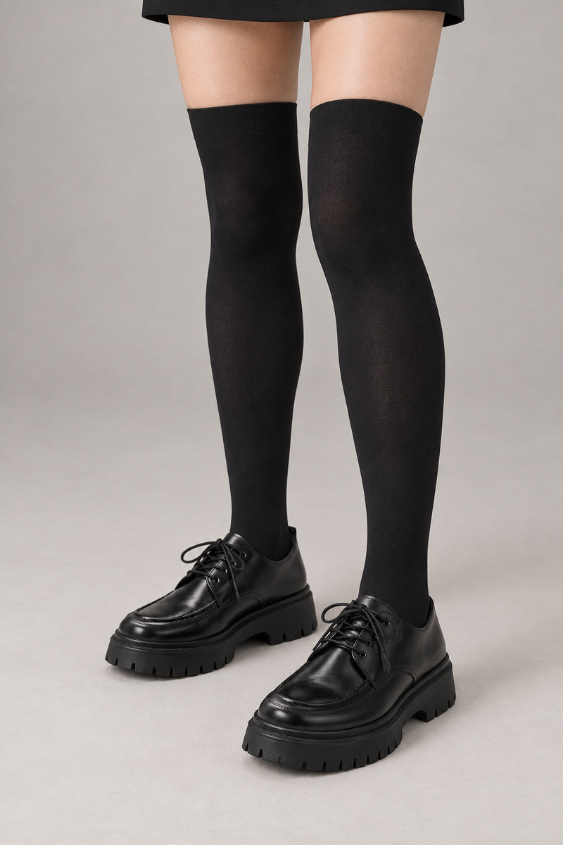 Japanese School High Socks 'Ashimoto' – black thigh-high Japanese school socks worn with loafers, front view on model