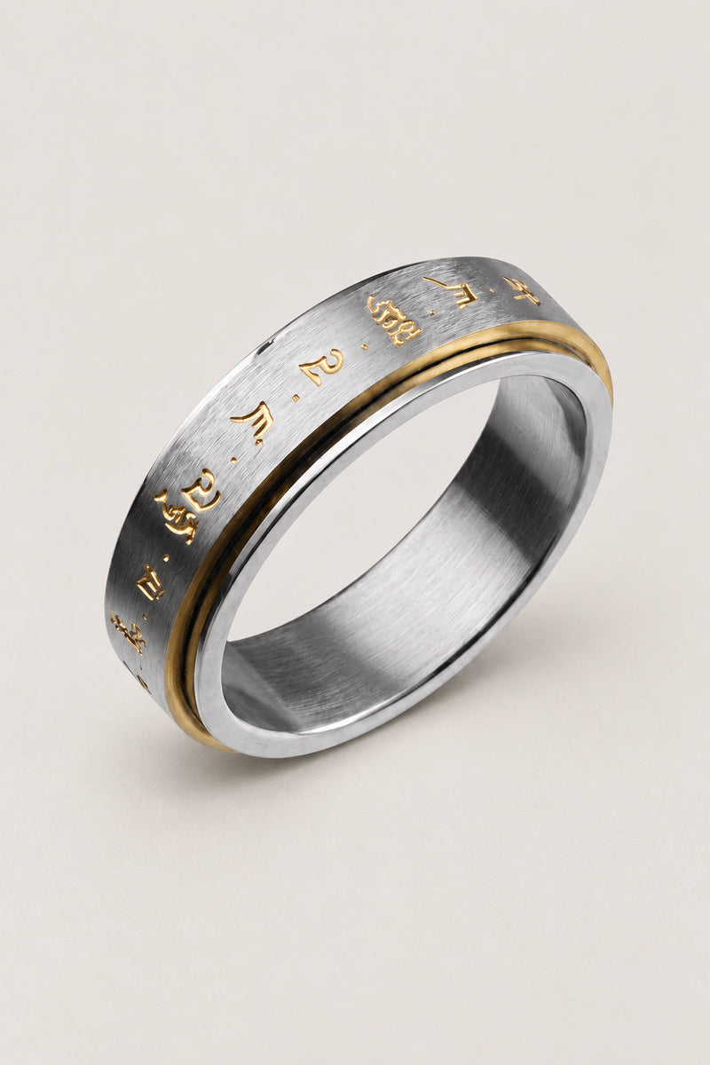 Japanese Spinner Ring 'Mawari' – stainless steel spinner ring with brushed inner band and gold Sanskrit engraved outer band, Japanese anxiety ring, studio view