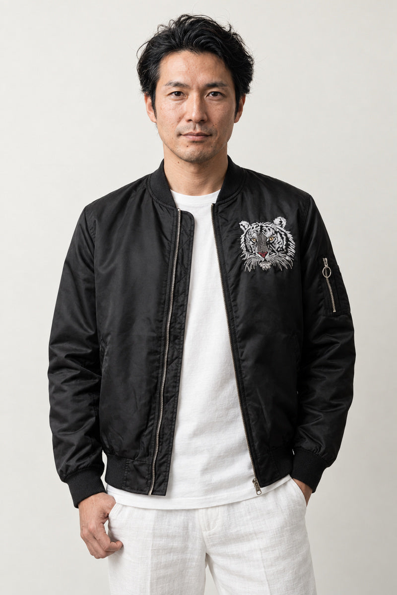 Japanese Tiger Bomber Jacket 'Kinko' – black version, bomber jacket with embroidered white tiger face, front view on model