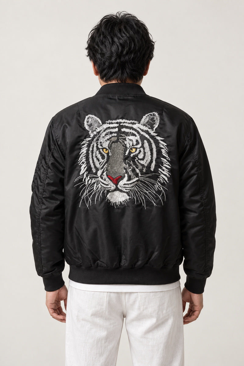 Japanese Tiger Bomber Jacket 'Kinko' – back view of the black version, large embroidered white tiger face on the back