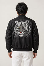 Japanese Tiger Bomber Jacket 'Kinko' – back view of the black version, large embroidered white tiger face on the back