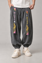 Kanji Band Wide Workwear Pants 'Daiku' – grey version of the kanji band wide workwear pants, front view on model