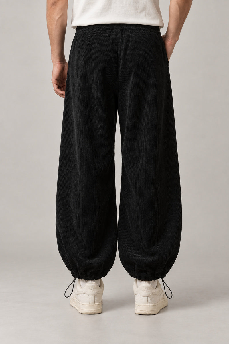 Kanji Band Wide Workwear Pants 'Daiku' – black wide workwear pants without band, front view on model
