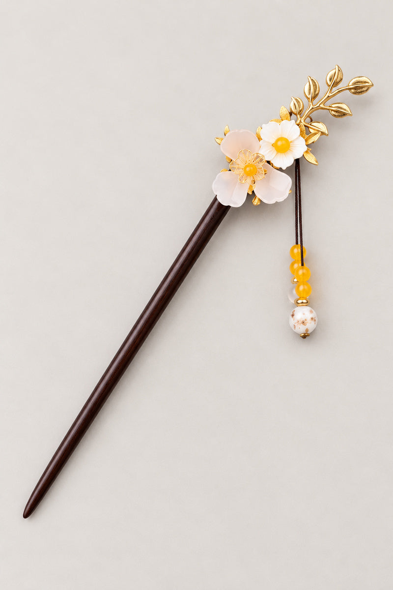 Kanzashi – kanzashi hair stick with white and yellow flower, gold leaves and amber tassel, studio view