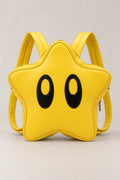 Kawaii Backpack – yellow star shaped backpack with two black eyes and zip, kawaii Japanese mini backpack, front view, studio