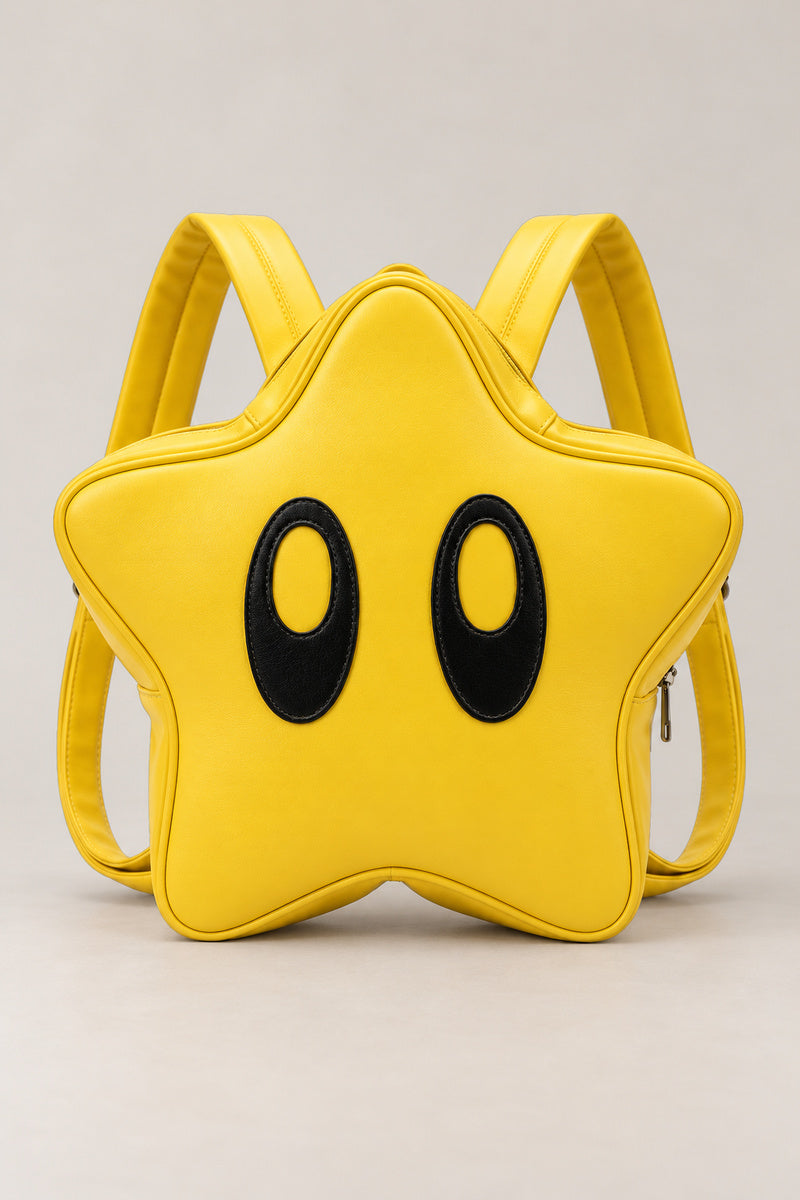 Kawaii Backpack – yellow star shaped backpack with two black eyes and zip, kawaii Japanese mini backpack, front view, studio