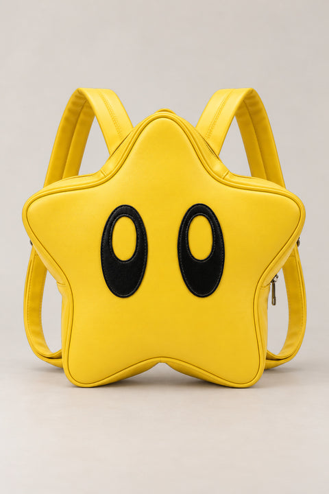 Kawaii Backpack – yellow star shaped backpack with two black eyes and zip, kawaii Japanese mini backpack, front view, studio