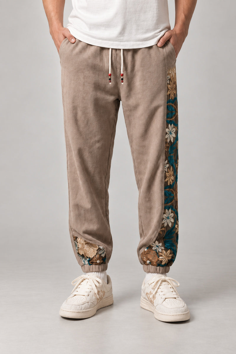 Kimono Panel Floral Joggers 'Hanaobi' – beige version of the kimono panel floral joggers, front view on model