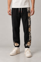 Kimono Panel Floral Joggers 'Hanaobi' – black kimono panel floral joggers, front view on model