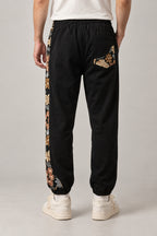 Kimono Panel Floral Joggers 'Hanaobi' – back view of the black kimono panel floral joggers